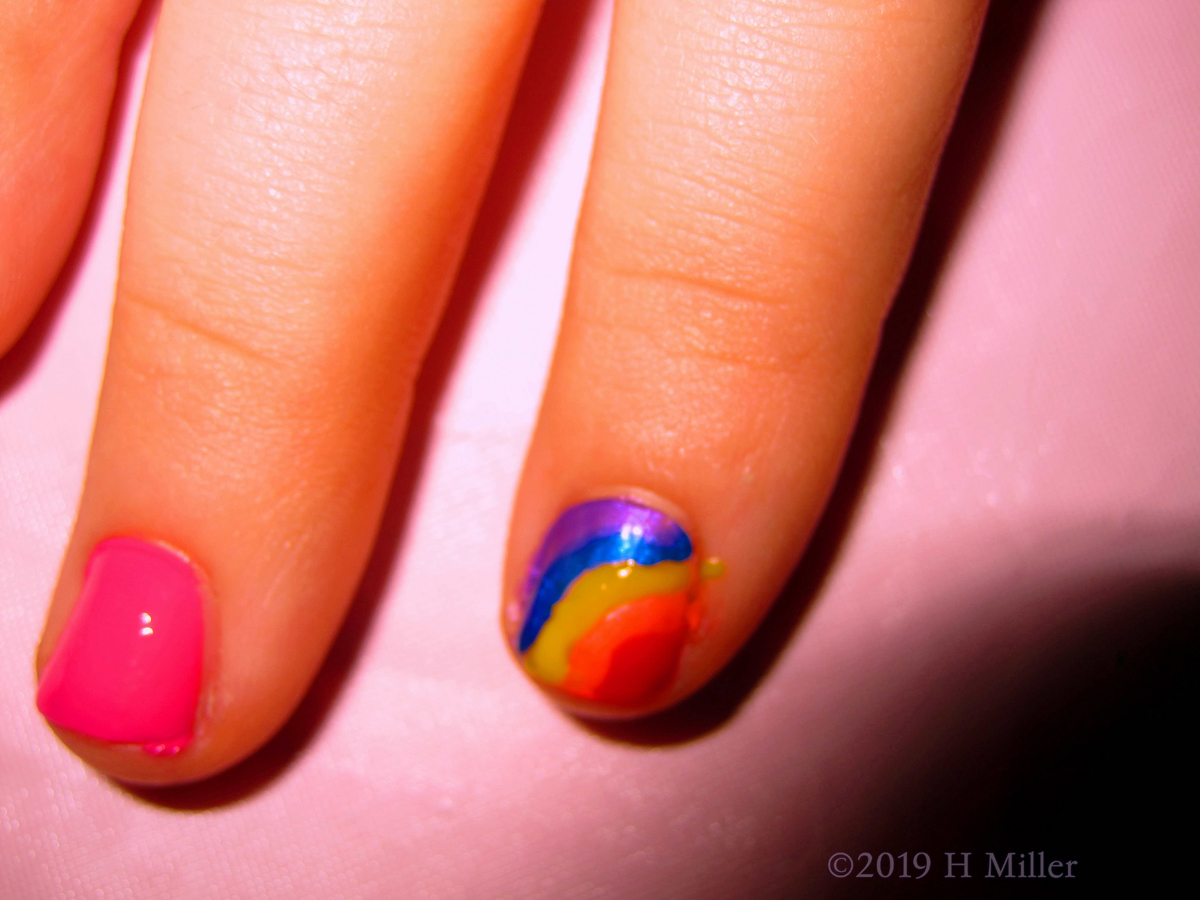 Close Up Of Beautiful Kids Mini Mani With Rainbow Nail Design! 