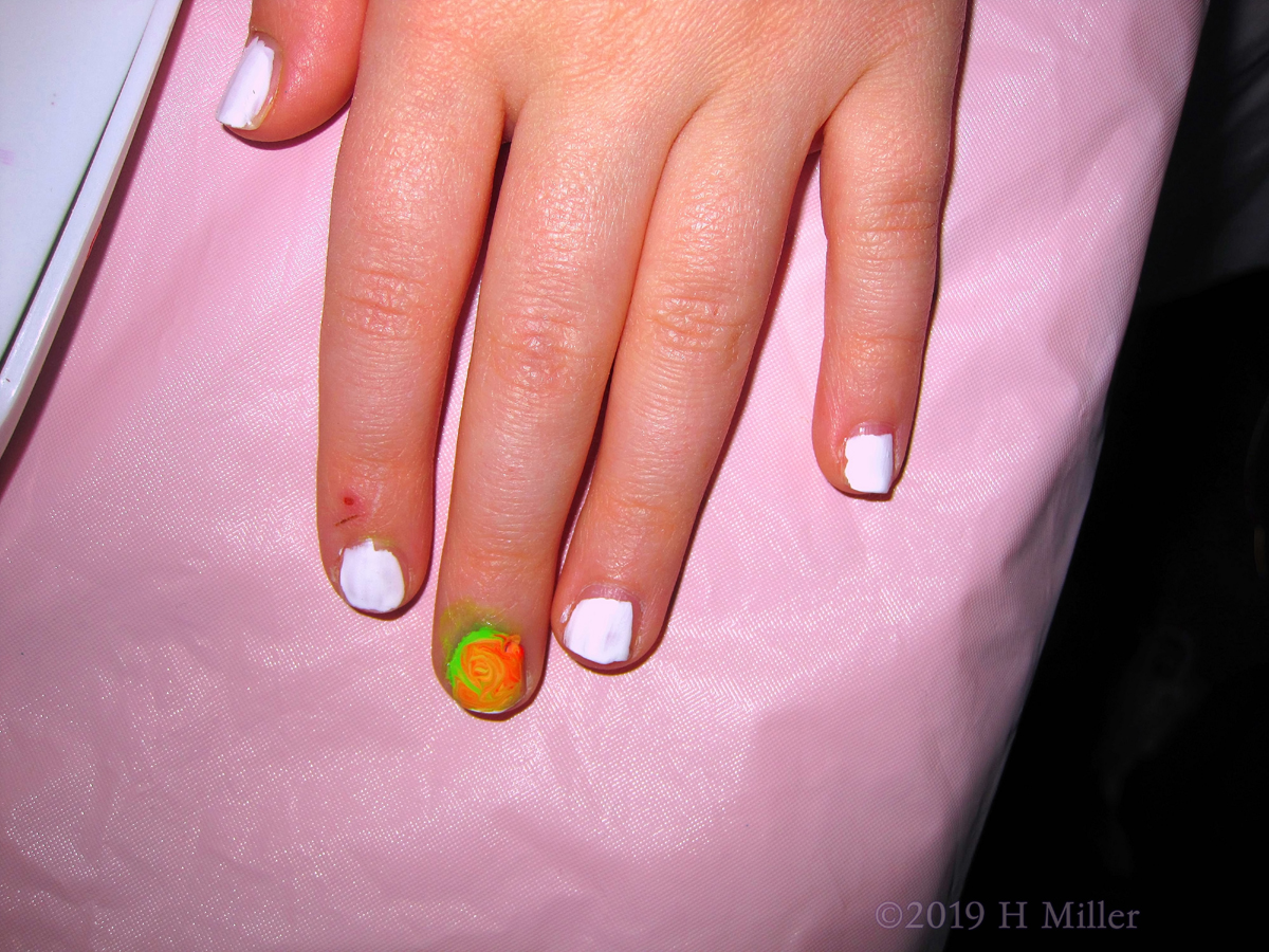 Green And Orange Marbled Nail Design With Swirled Nail Colors Are Cute On This Girls Manicure! 