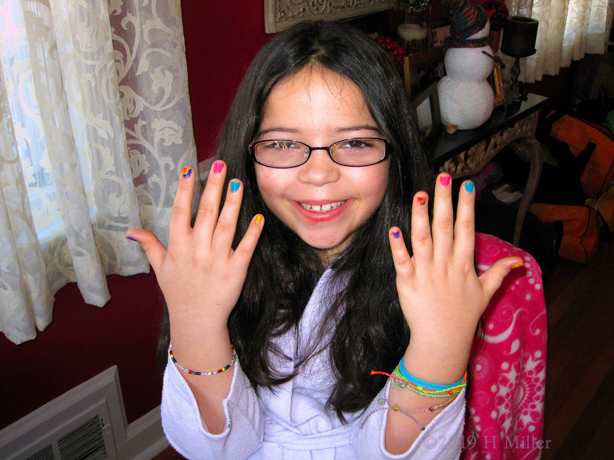 Party Guest Is Pleased With Her Lovely Kids Mani 