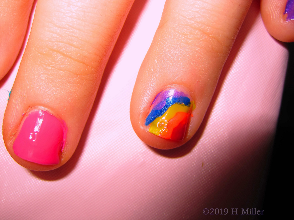Swirly Colors Are Too Cute On This Kids Nail Design! 