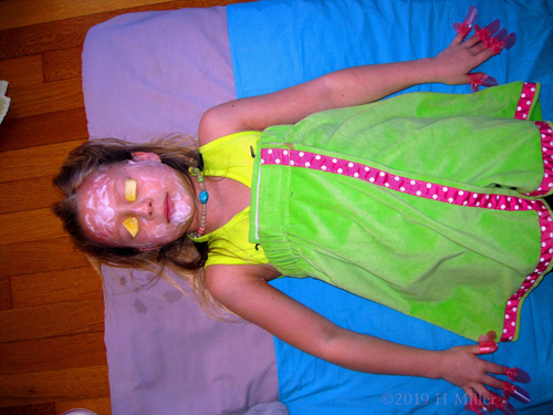 She Is Definitely Enjoying Being Pampered With A Girls Facial At The Spa Party She Is Definitely Enjoying Being Pampered With A Girls Facial At The Spa Party