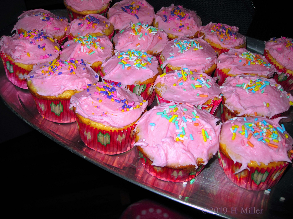Yummy Cupcakes With Pink Icing And Colorful Sprinkles For The Girls Spa! 