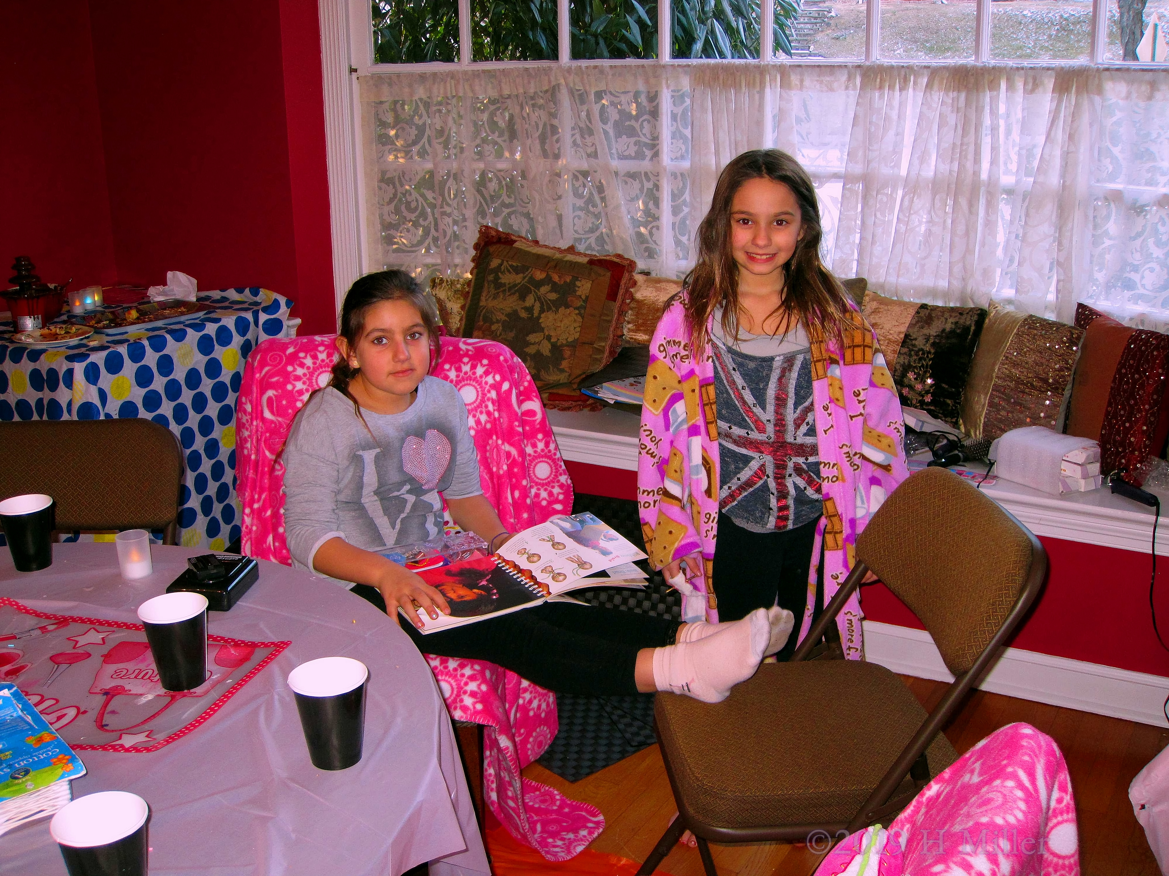 Happy Birthday Girl Poses With A Party Guest 