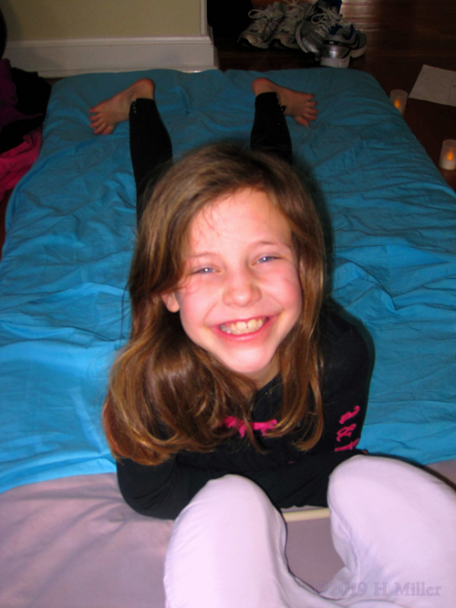 Happy Party Guest Sporting A Huge Smile Before Kids Massage!