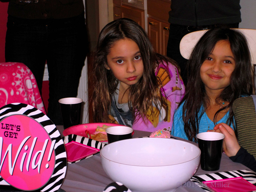 Olivia Poses With Guest During Snacks At The Girls Spa Party