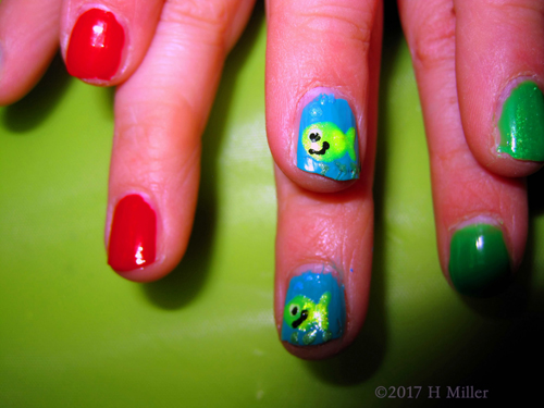 Close Up Of The Cute Fishes Nail Art.