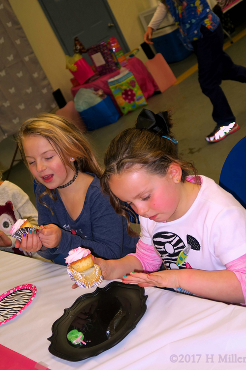 Eating The Delicious Birthday Cupcakes Eating The Delicious Birthday Cupcakes