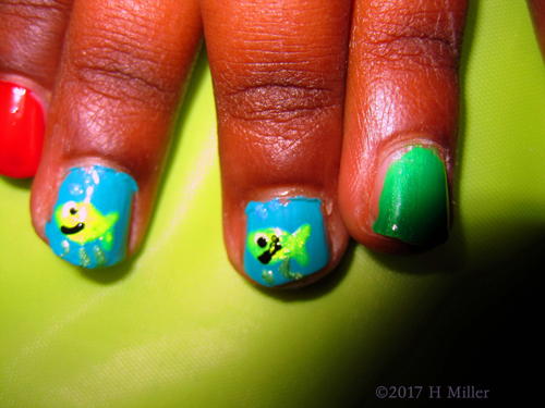 Fishes Nail Design For Kids In Green And Yellow Fishes Nail Design For Kids In Green And Yellow