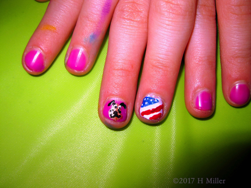 Pink Girls Mani With An Adorable Nail Art Design Of Dogs And American Flags. Pink Girls Mani With An Adorable Nail Art Design Of Dogs And American Flags.