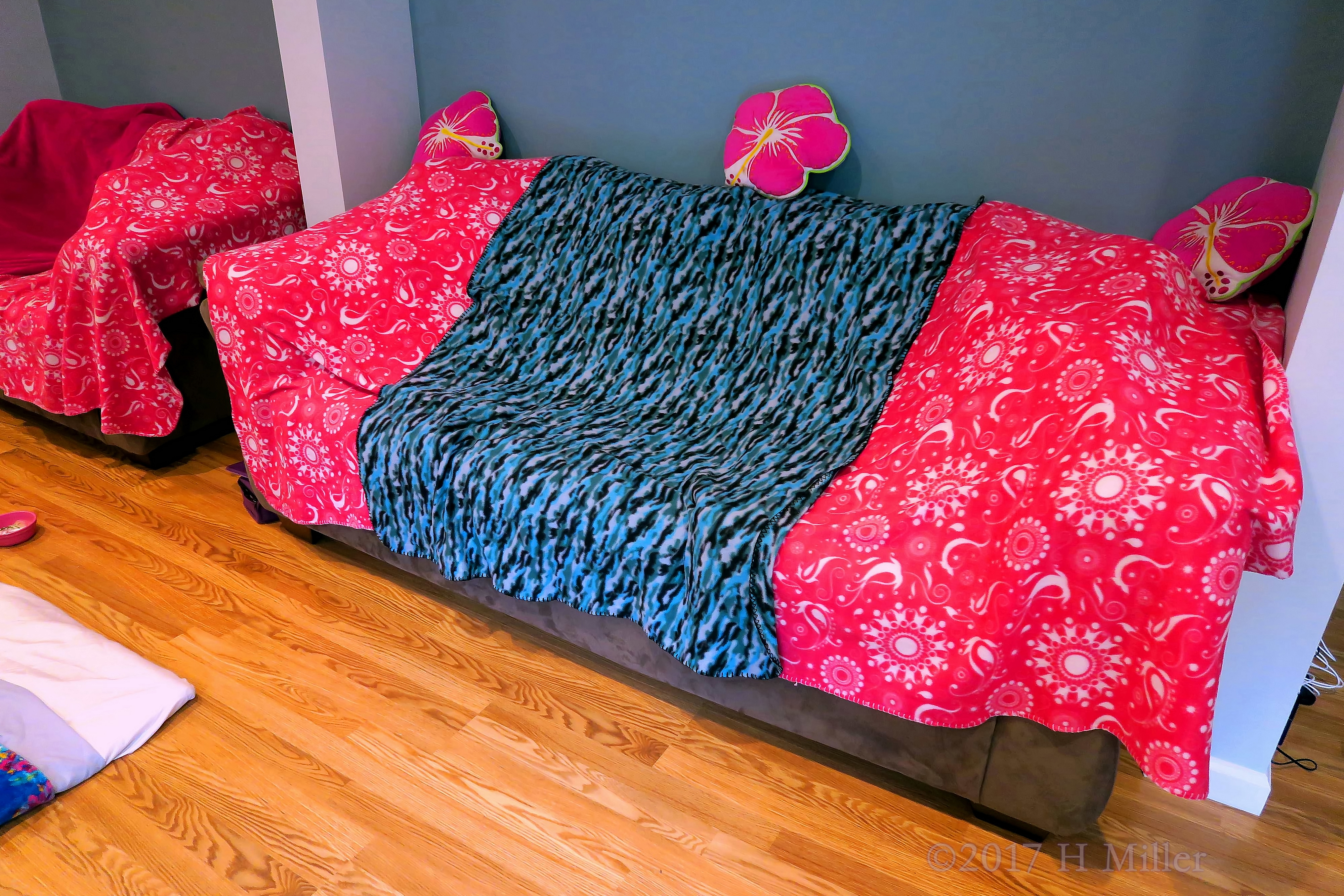 Couches Covered With Kids Spa Throws At The Spa Party For Girls. Couches Covered With Kids Spa Throws At The Spa Party For Girls.