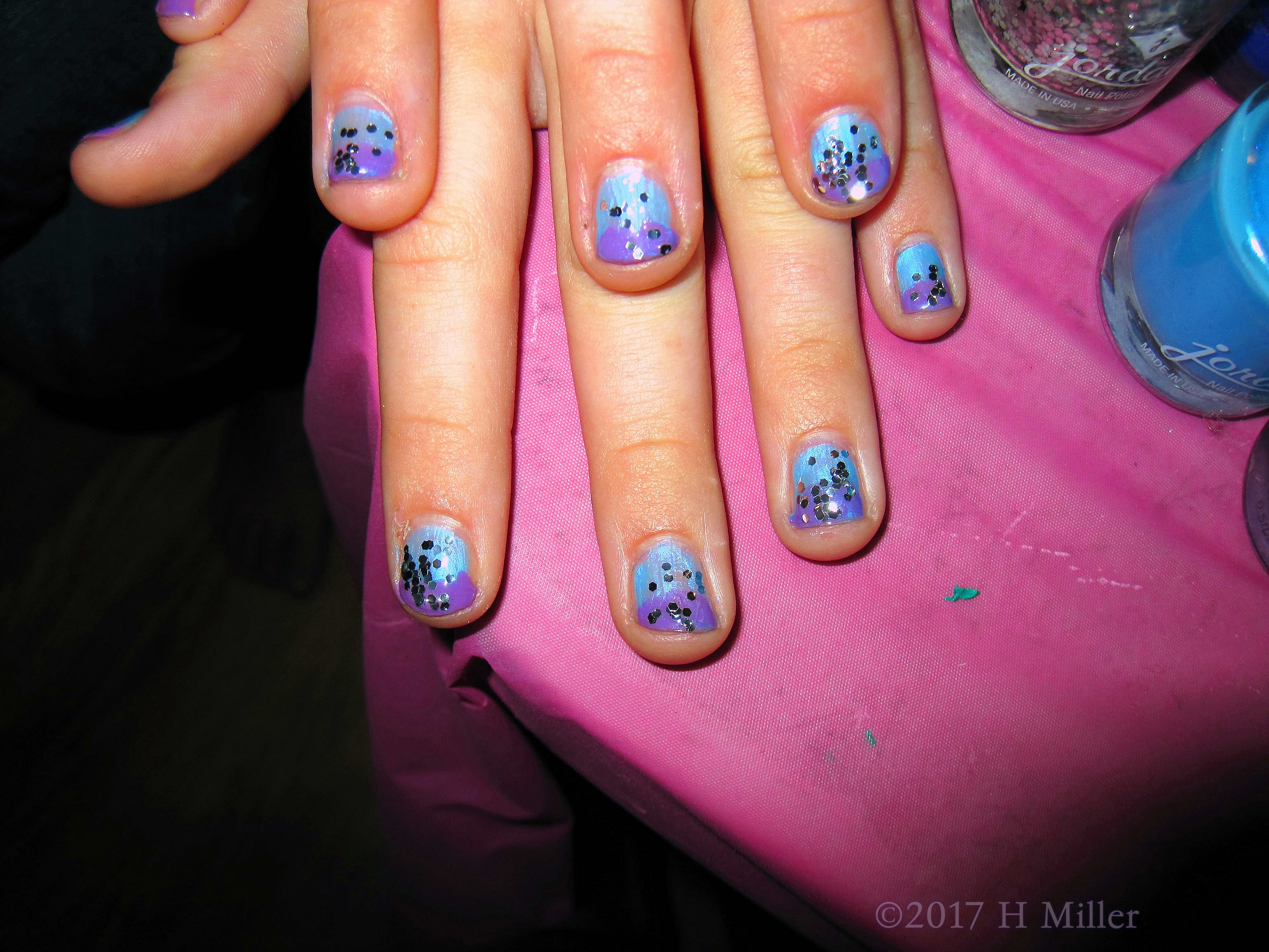 Pretty Ombre Nail Design And Glittery Top Coat.