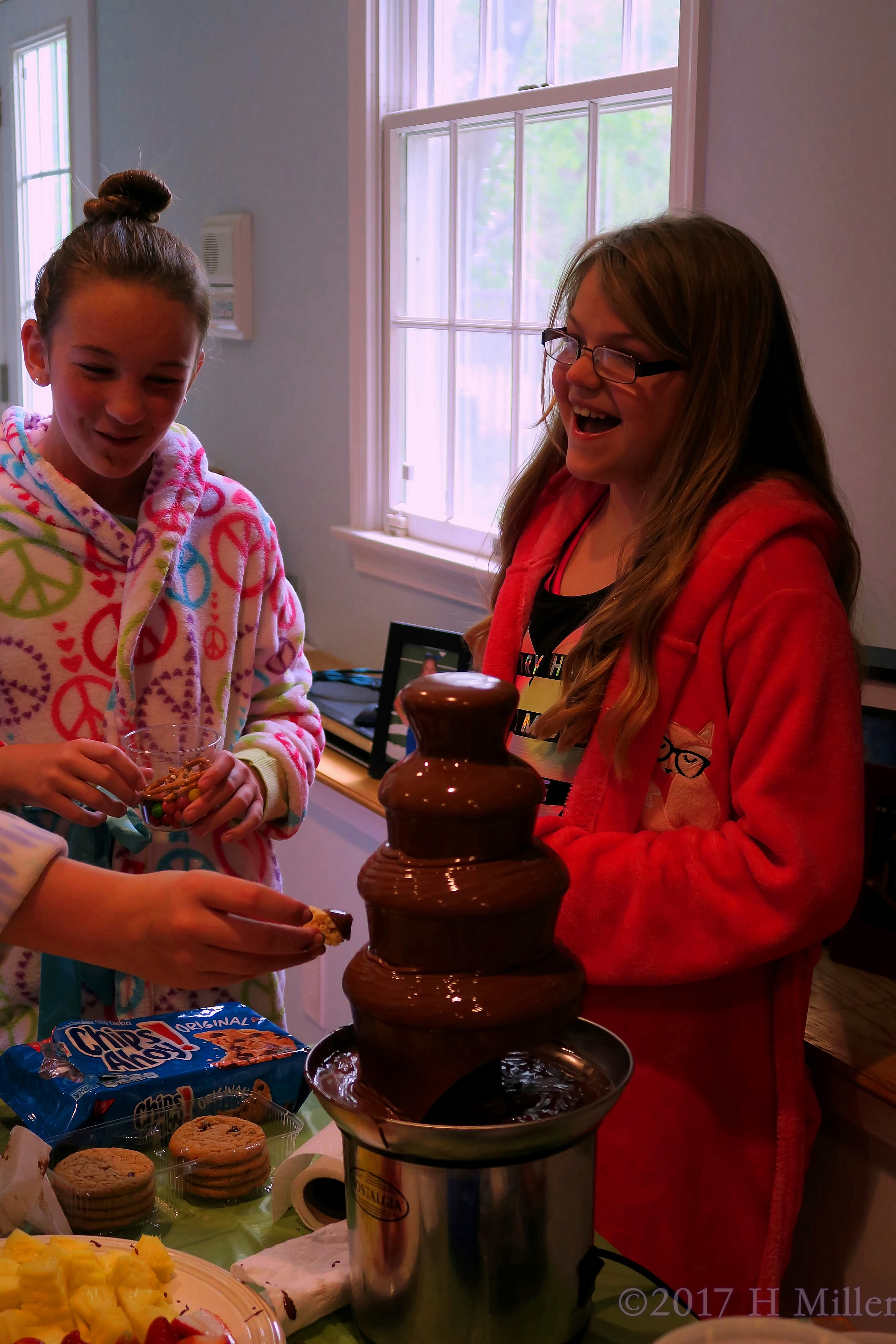 Waiting For Their Turn To Taste The Chocolate Fountain! 