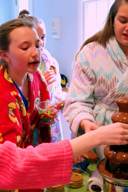 Kids Enjoying Snacks At The Spa Party For Girls.