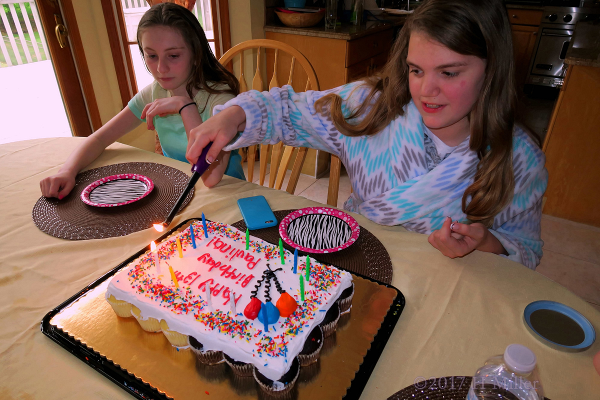 Birthday Girl Lights Up The Candles On Her Kids Spa Birthday Cake! 