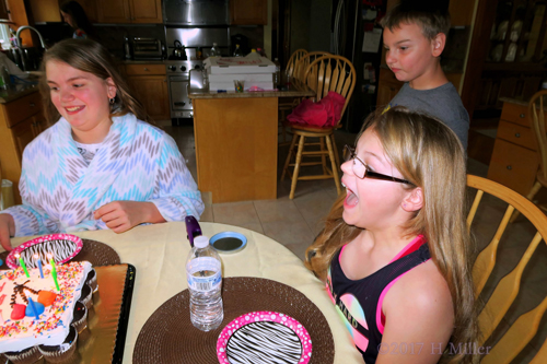 The Birthday Girl And Her Sister Laughing At The Cake Table!