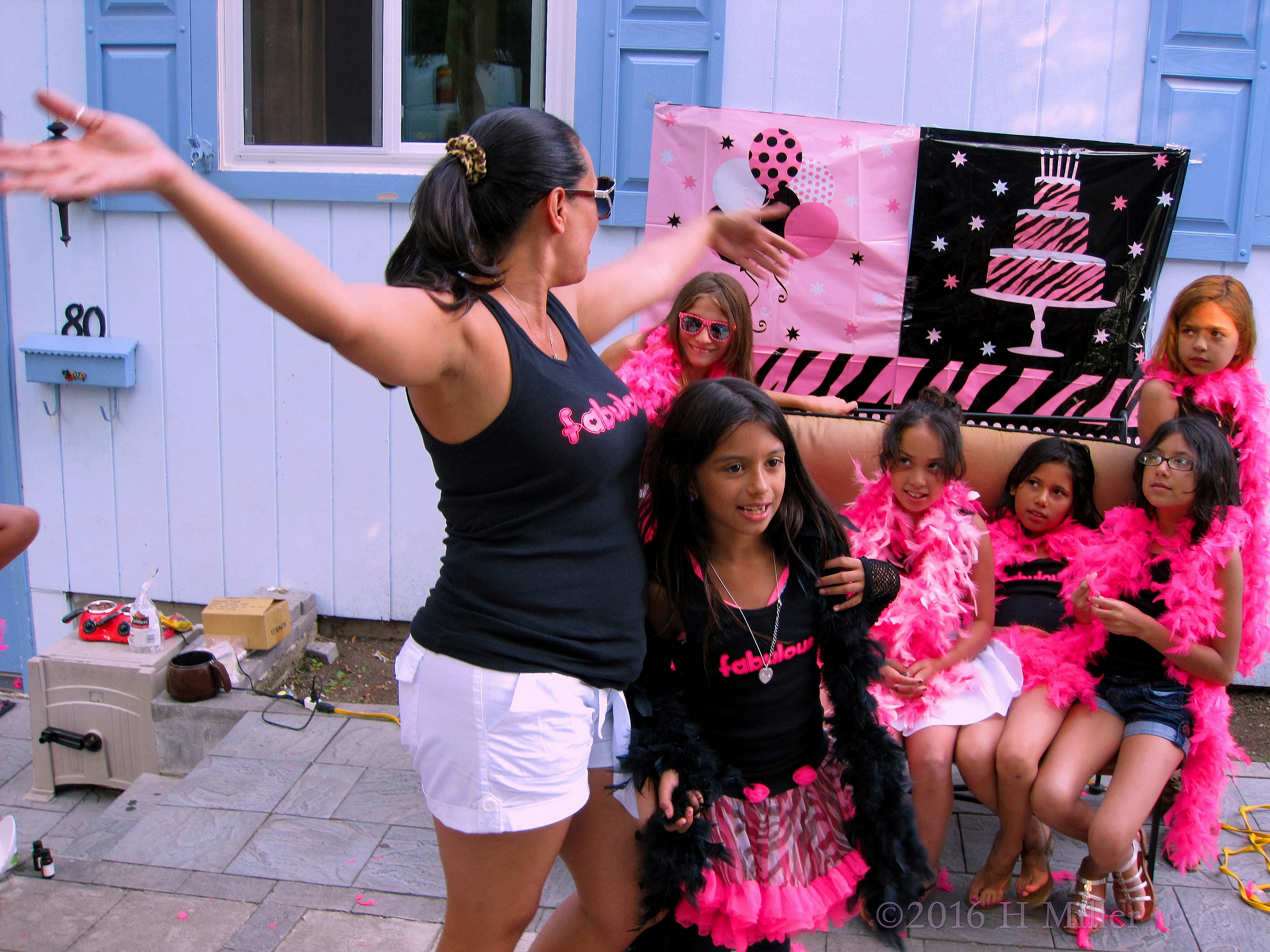 Mom Helping The Kids Out At The Kids Party Mom Helping The Kids Out At The Kids Party