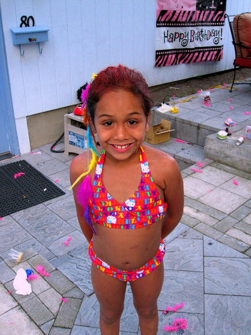 Showing Her Hairstyle From The Kids Spa Party