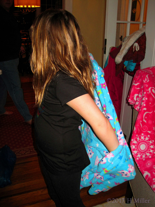 A Party Guest Is Wearing Her Spa Robe A Party Guest Is Wearing Her Spa Robe