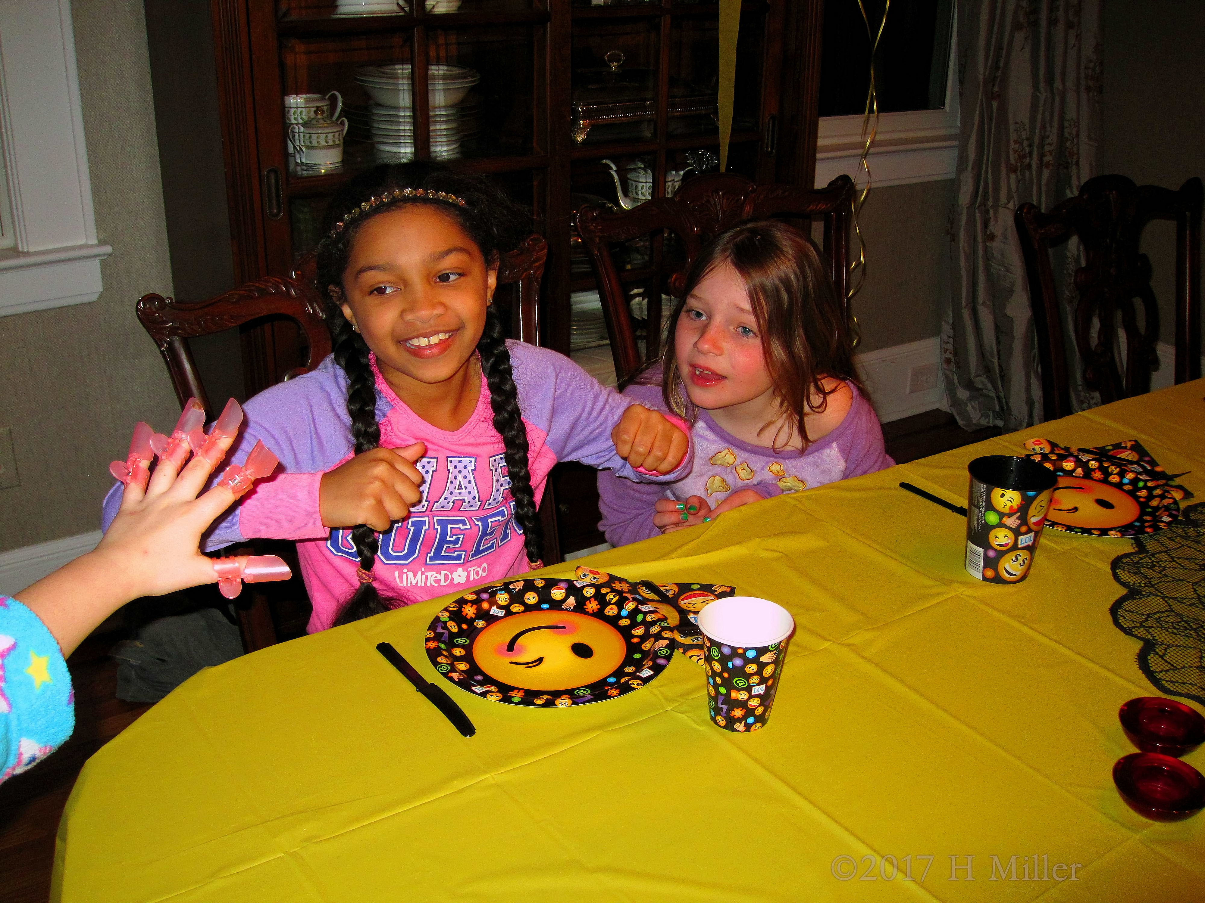 Showing Off Her Manicure Beneath The Nail Protectors Showing Off Her Manicure Beneath The Nail Protectors