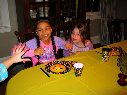 Showing Off Her Manicure Beneath The Nail Protectors Showing Off Her Manicure Beneath The Nail Protectors