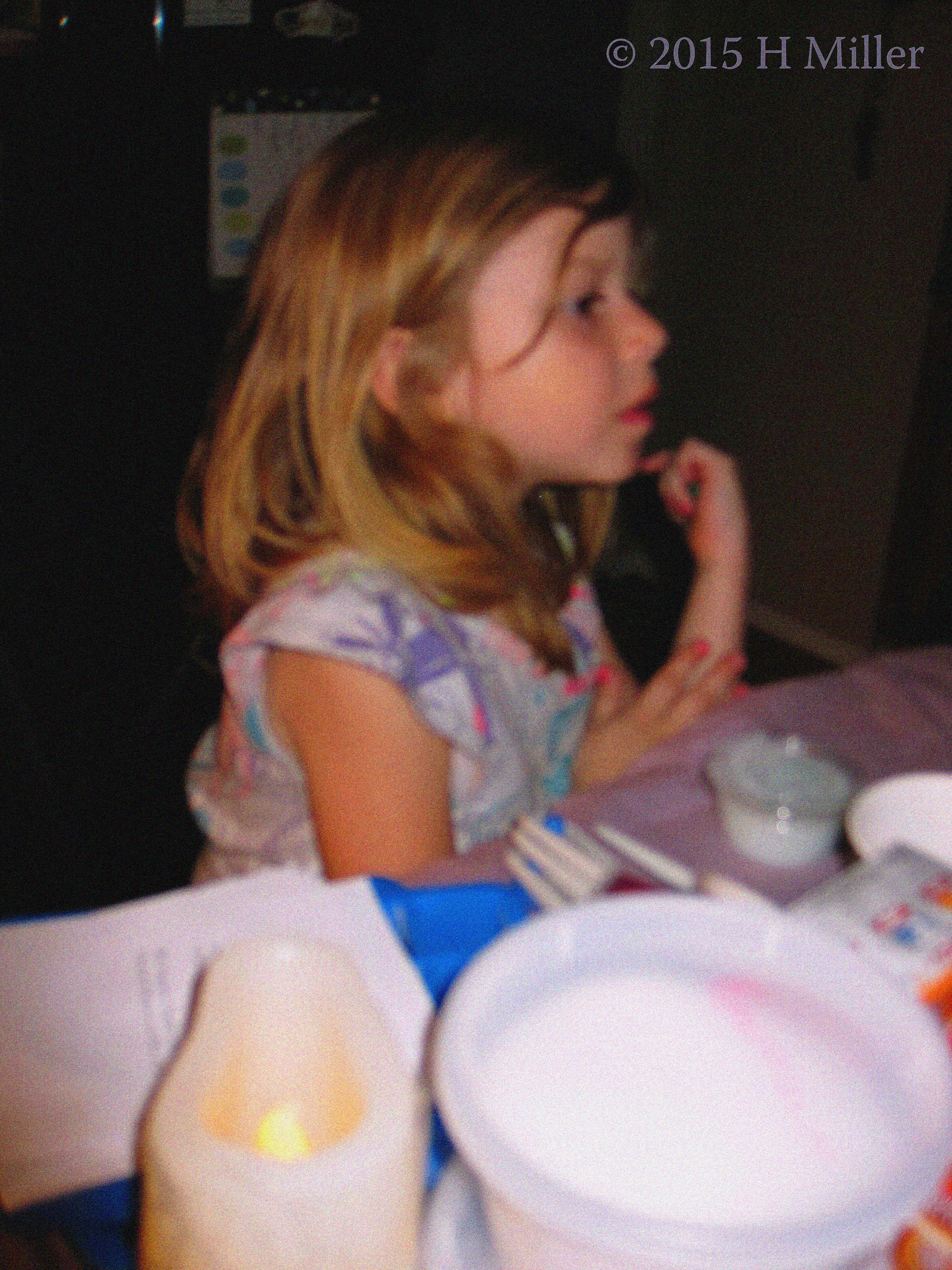 The Birthday Girl's Sister Doing Crafts.