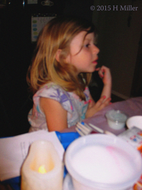 The Birthday Girl's Sister Doing Crafts
