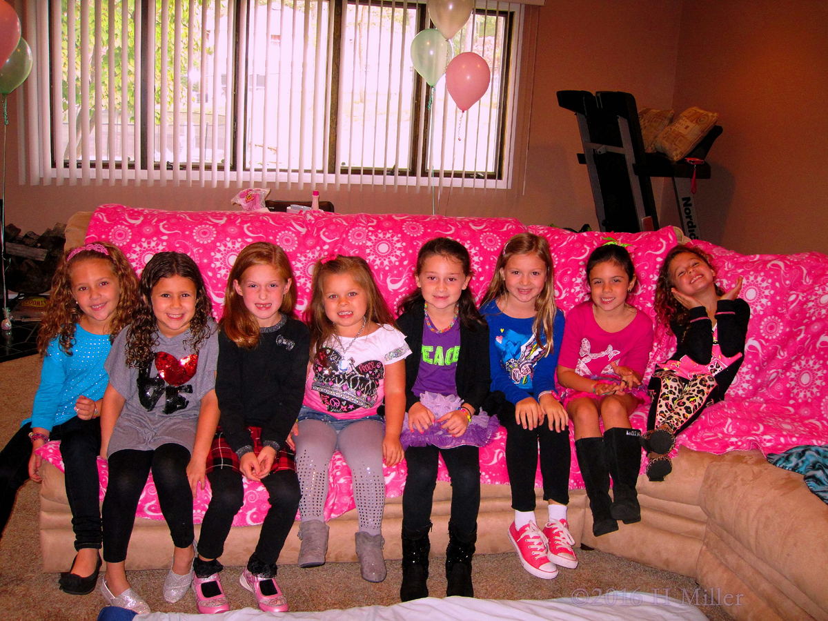 Birthday Girl Poses With Her Friends For A Picture