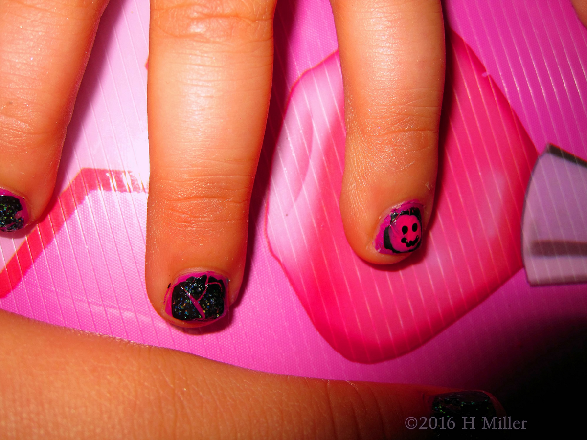 Kids Nail Art On Purple Mani With A Smiley Face Emoji! 