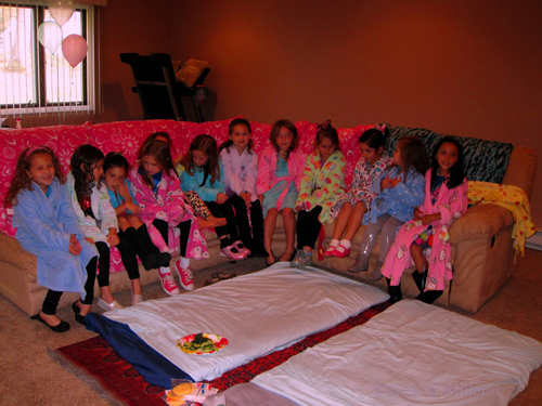 Party Guests In Colorful Spa Robe