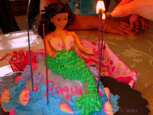 Lighting Up The Candles On The Beautiful Barbie Doll Cake