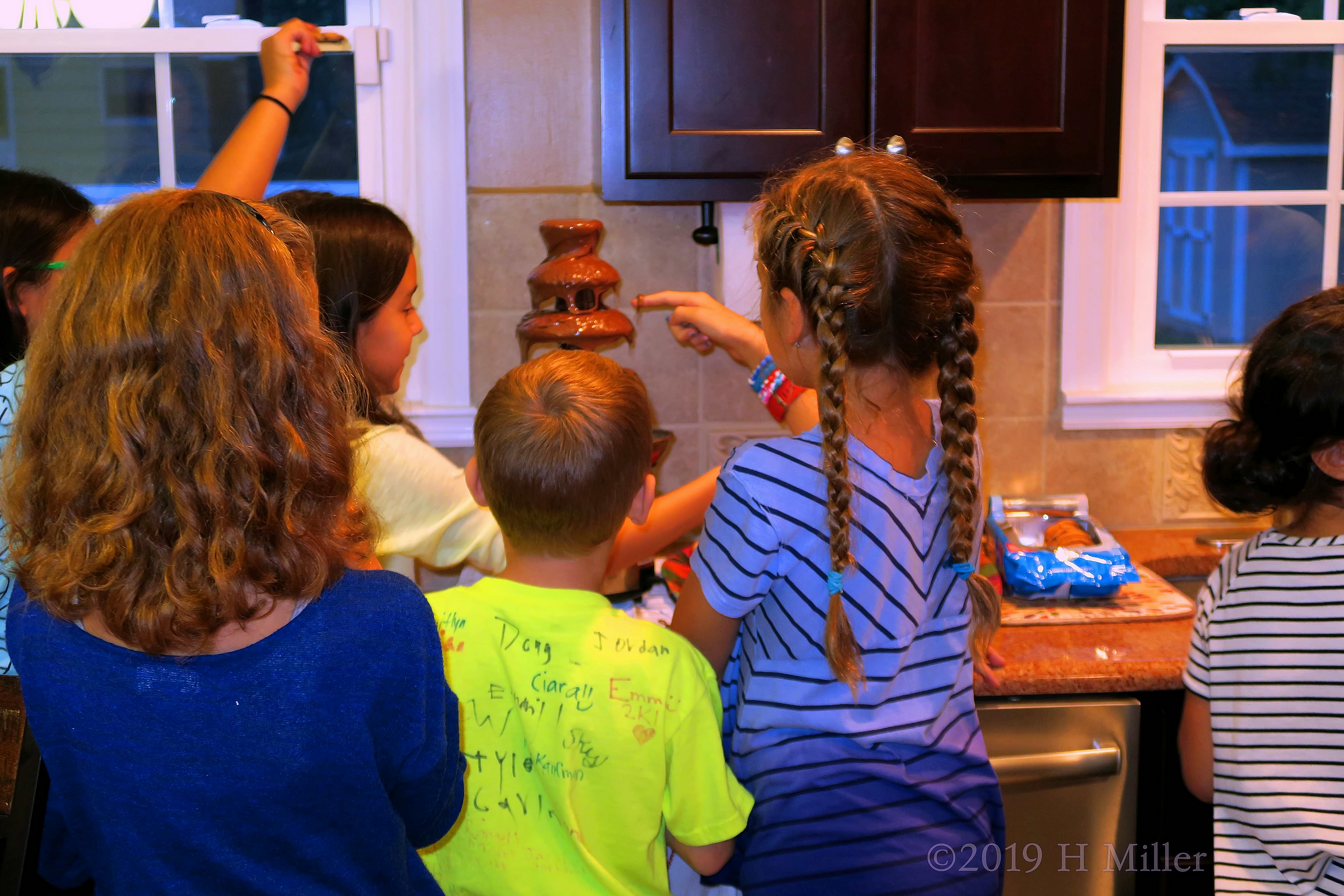 Racquel And Friends Enjoying Treats At The Chocolate Fountain 