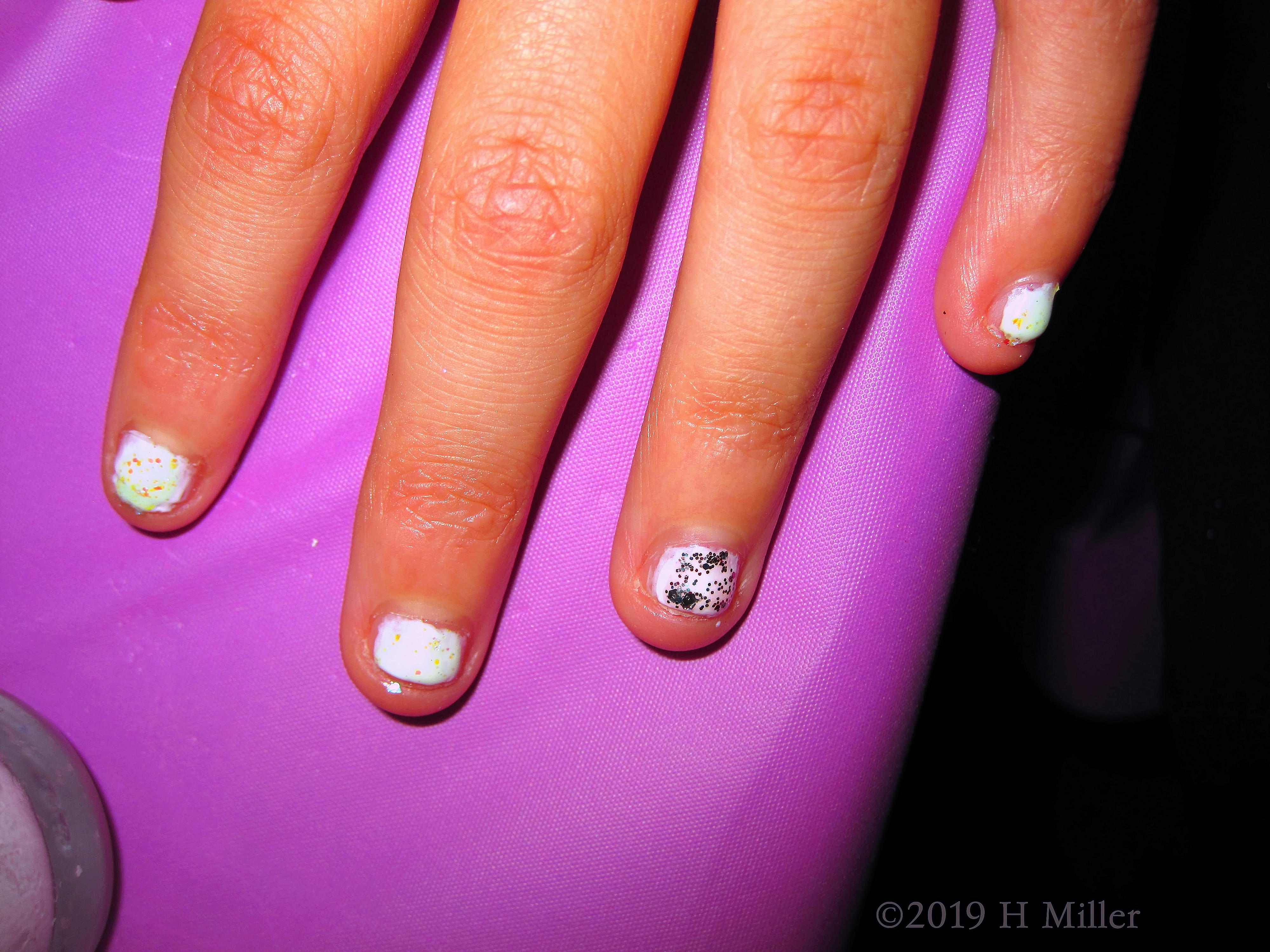 White Base Coat With Shimmer Overlay Girls Mani.