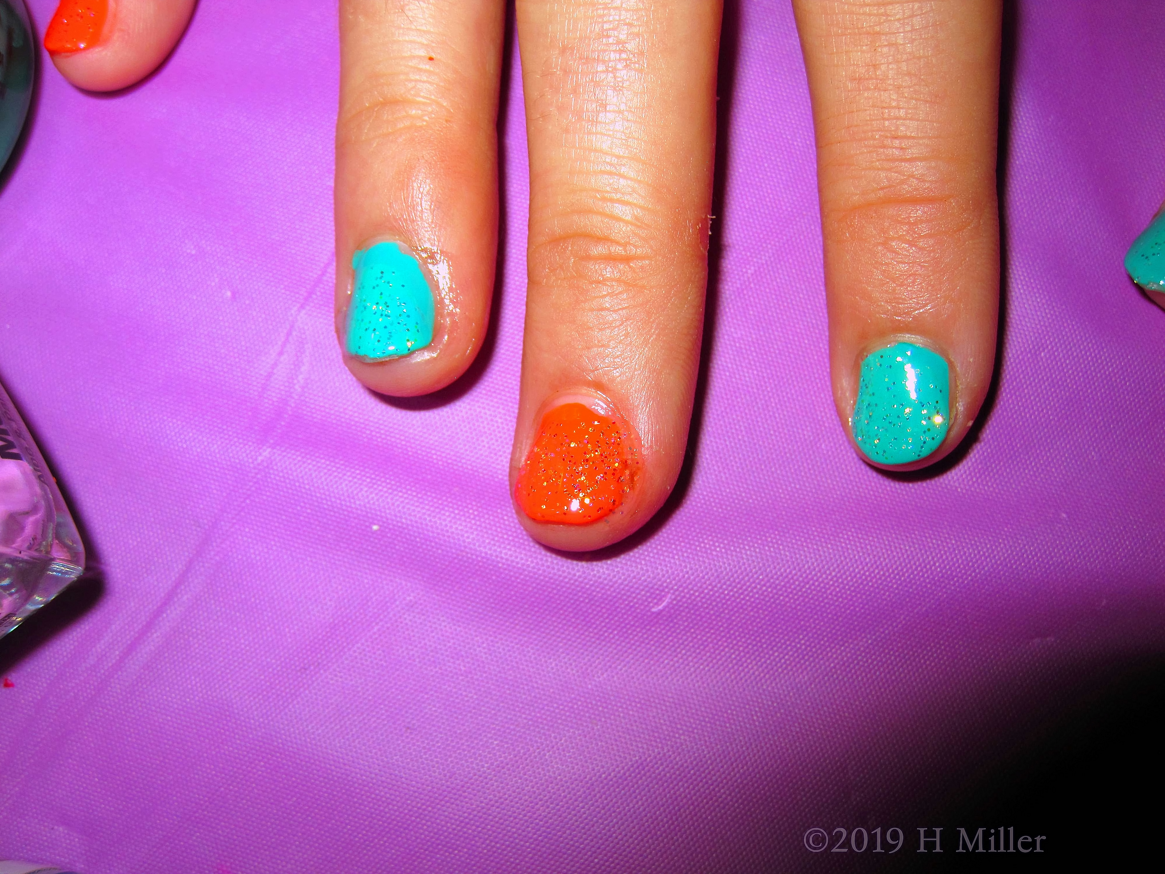 CLose Up Of Nail Design With Glitter Accent CLose Up Of Nail Design With Glitter Accent