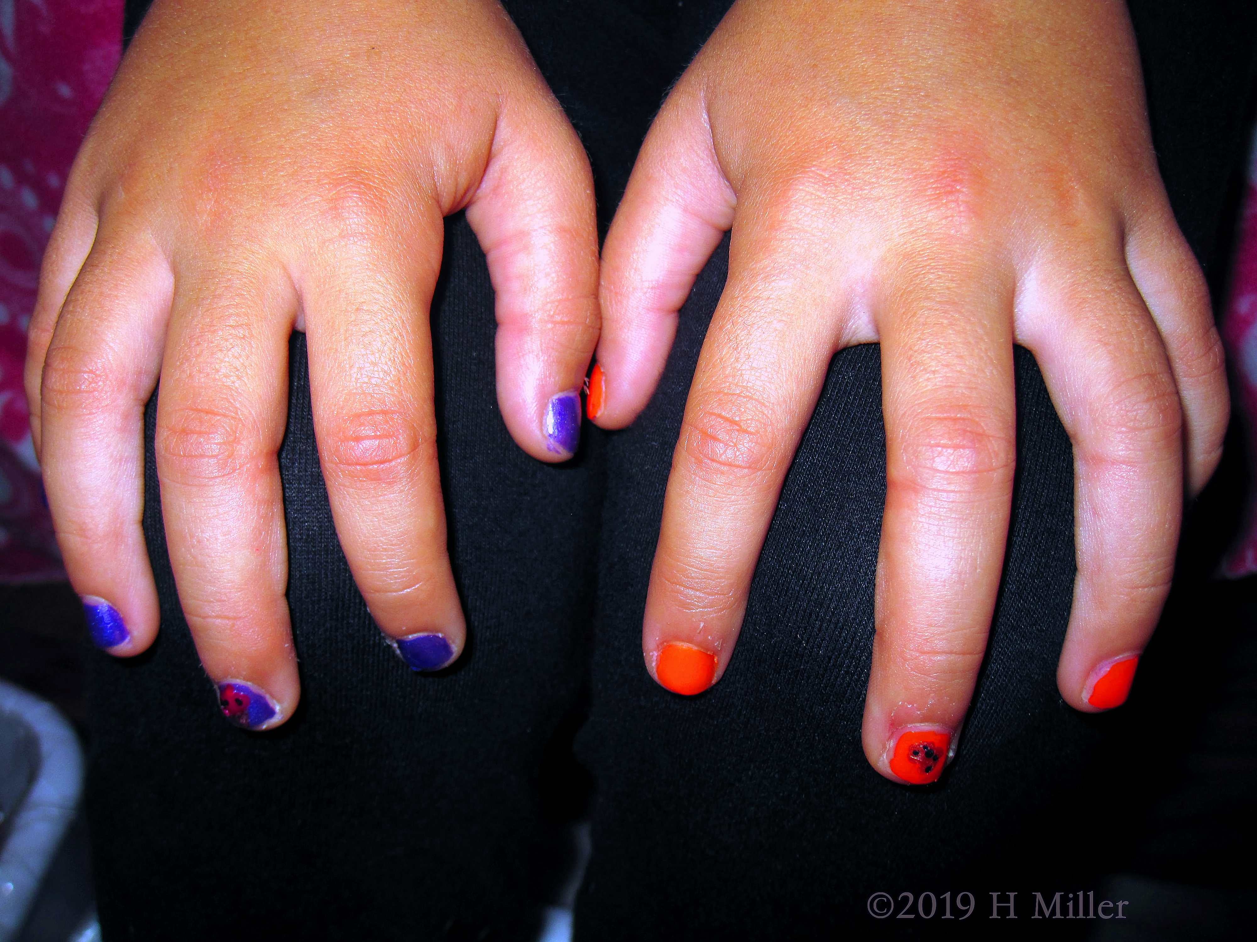 Red And Purple Nail Design On This Kids Manicure.