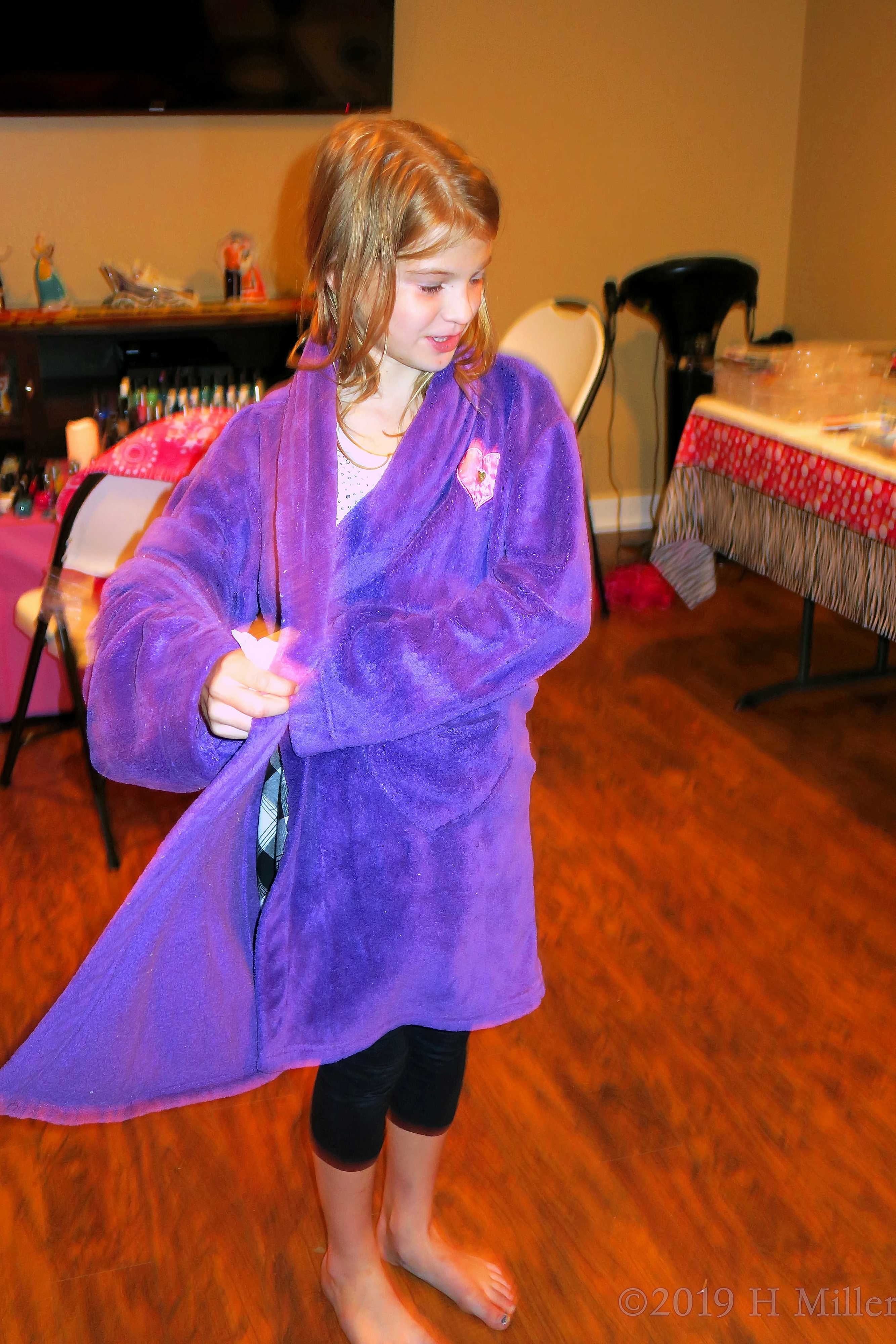 Party Guest Getting Comfy In Her Purple Spa Robe