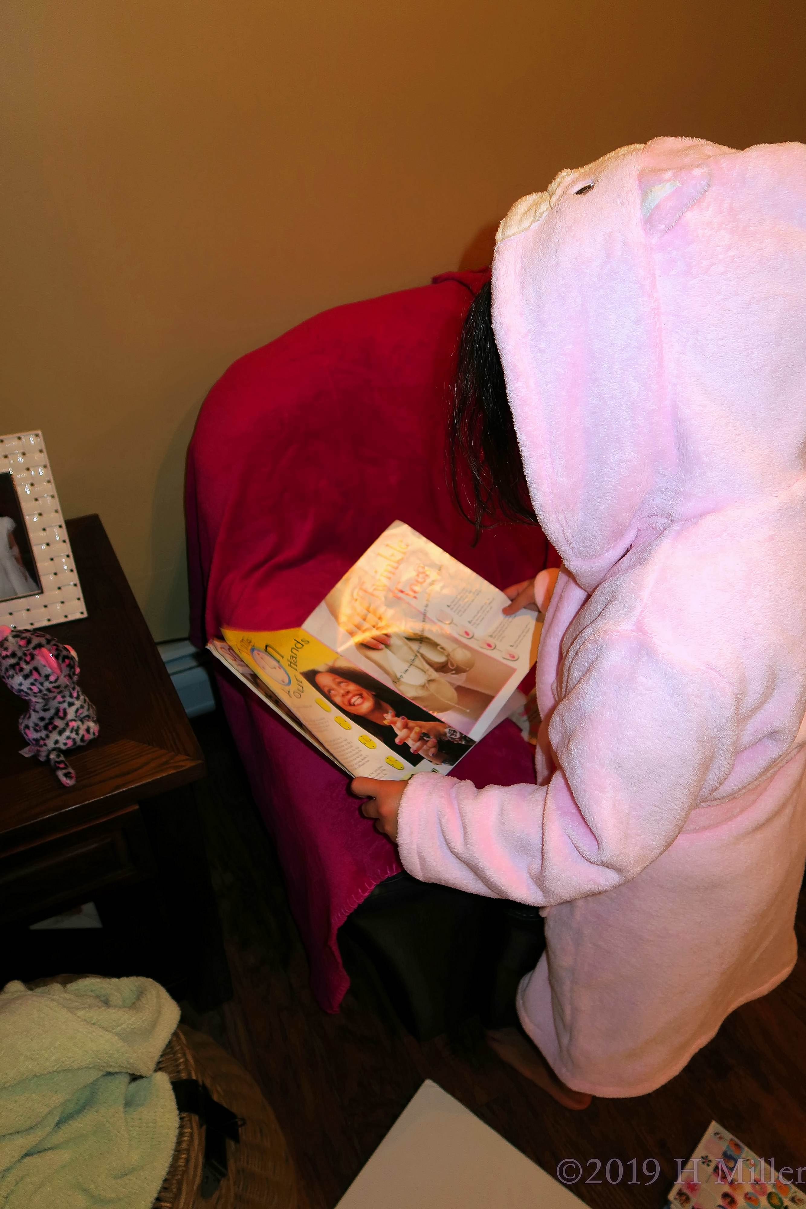 This Party Guest Browsing Through A Nail Design Book! 