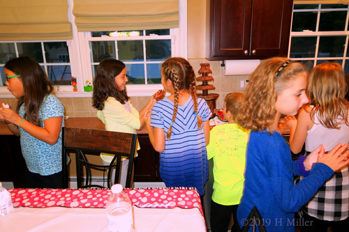 Racquel Chatting With Her Friend About The Chocolate Fondue Fountain