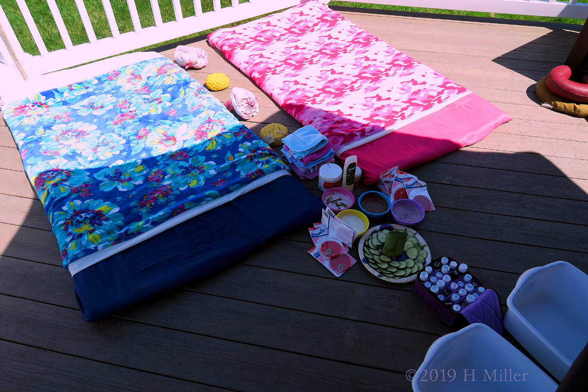 Cozy Spa Facial Mats Setup With Blue And Pink Spa Throws 
