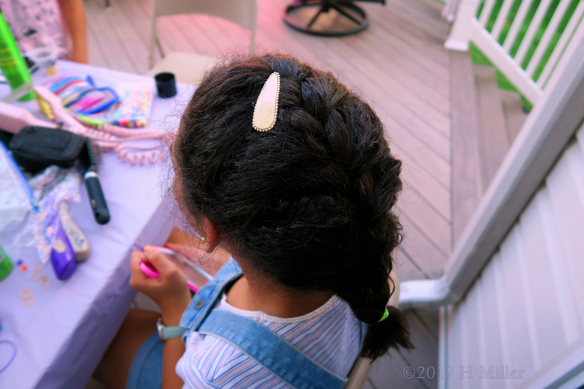 Hair Clip To Keep Her Braided Kids Hairstyle Together 