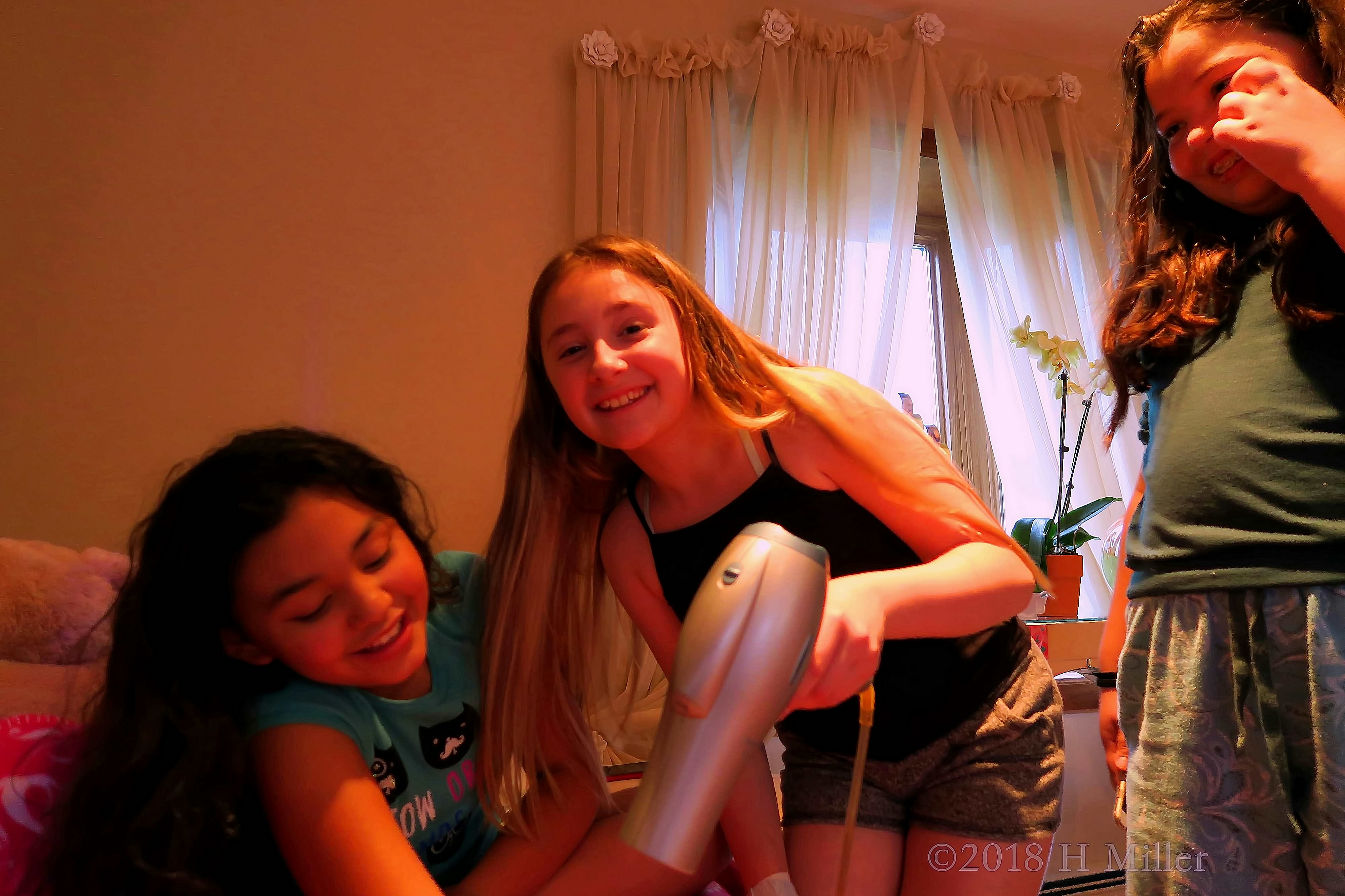 She Helps Her Friend With The Dryer To Get The Tattoo Dried. 