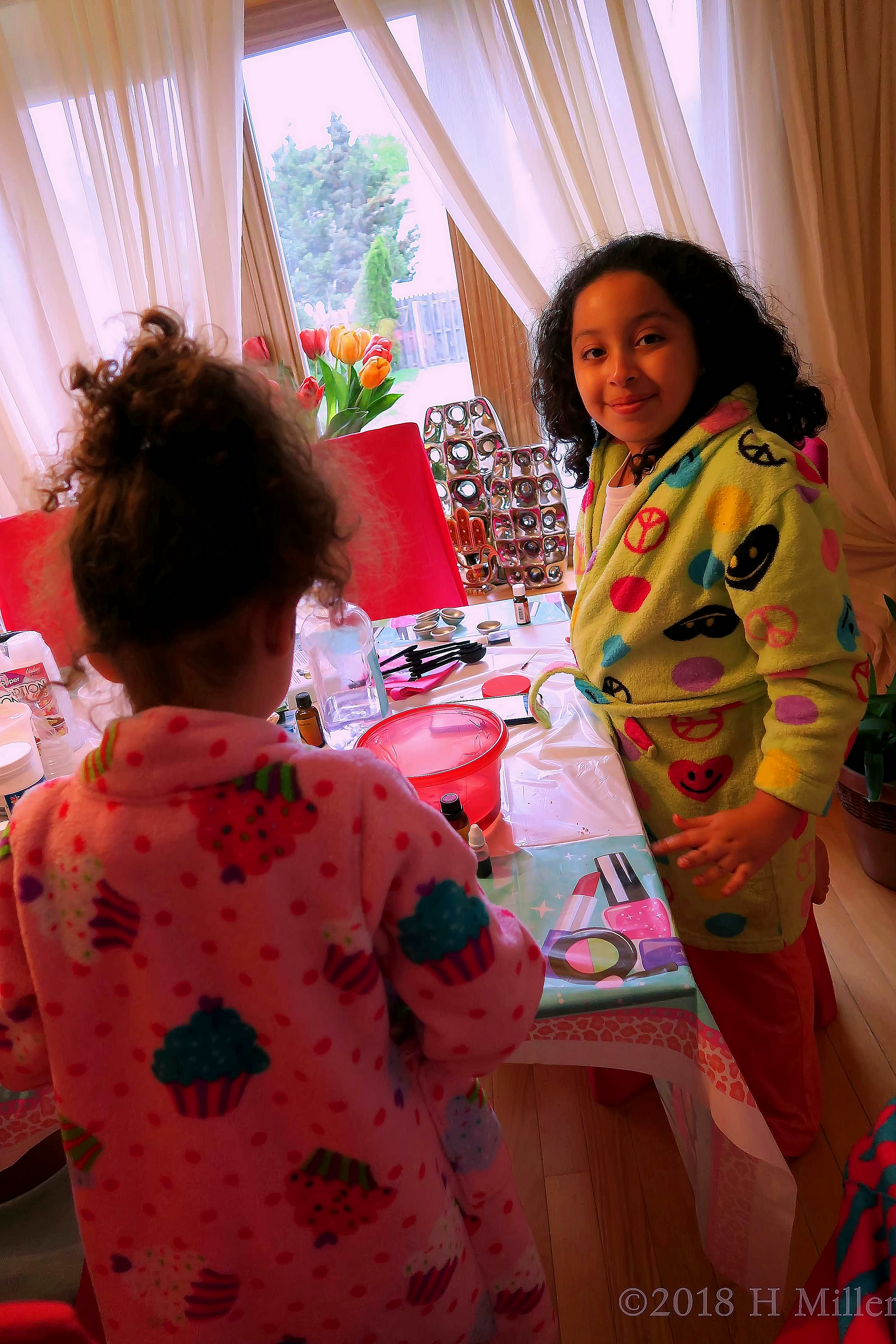 The Girls Are Exploring The Kids Manicure Table, Smiling And Happy! The Girls Are Exploring The Kids Manicure Table, Smiling And Happy!