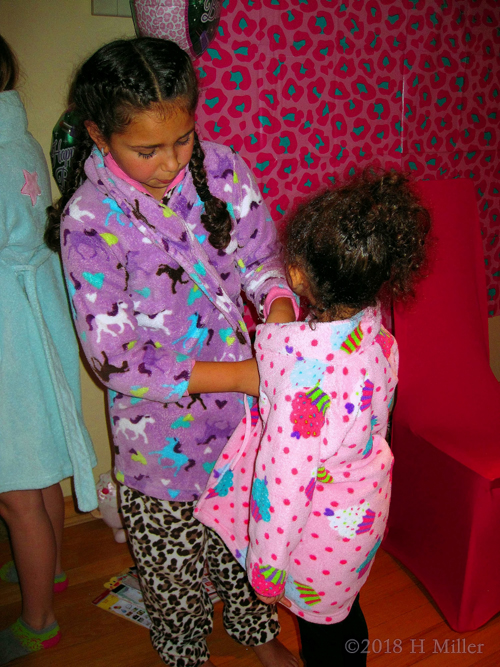 Helping The Little One With Her Spa Robe! Helping The Little One With Her Spa Robe!