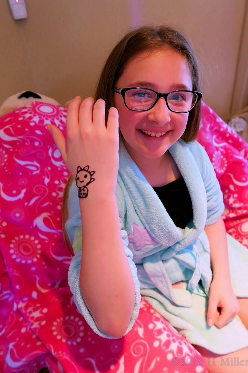 She Happily Shows Her Cute Jagua Temporary Tattoo. She Happily Shows Her Cute Jagua Temporary Tattoo.