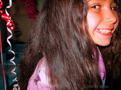 Side View Of The Birthday Girl's Kids Hairstyle. Side View Of The Birthday Girl's Kids Hairstyle.