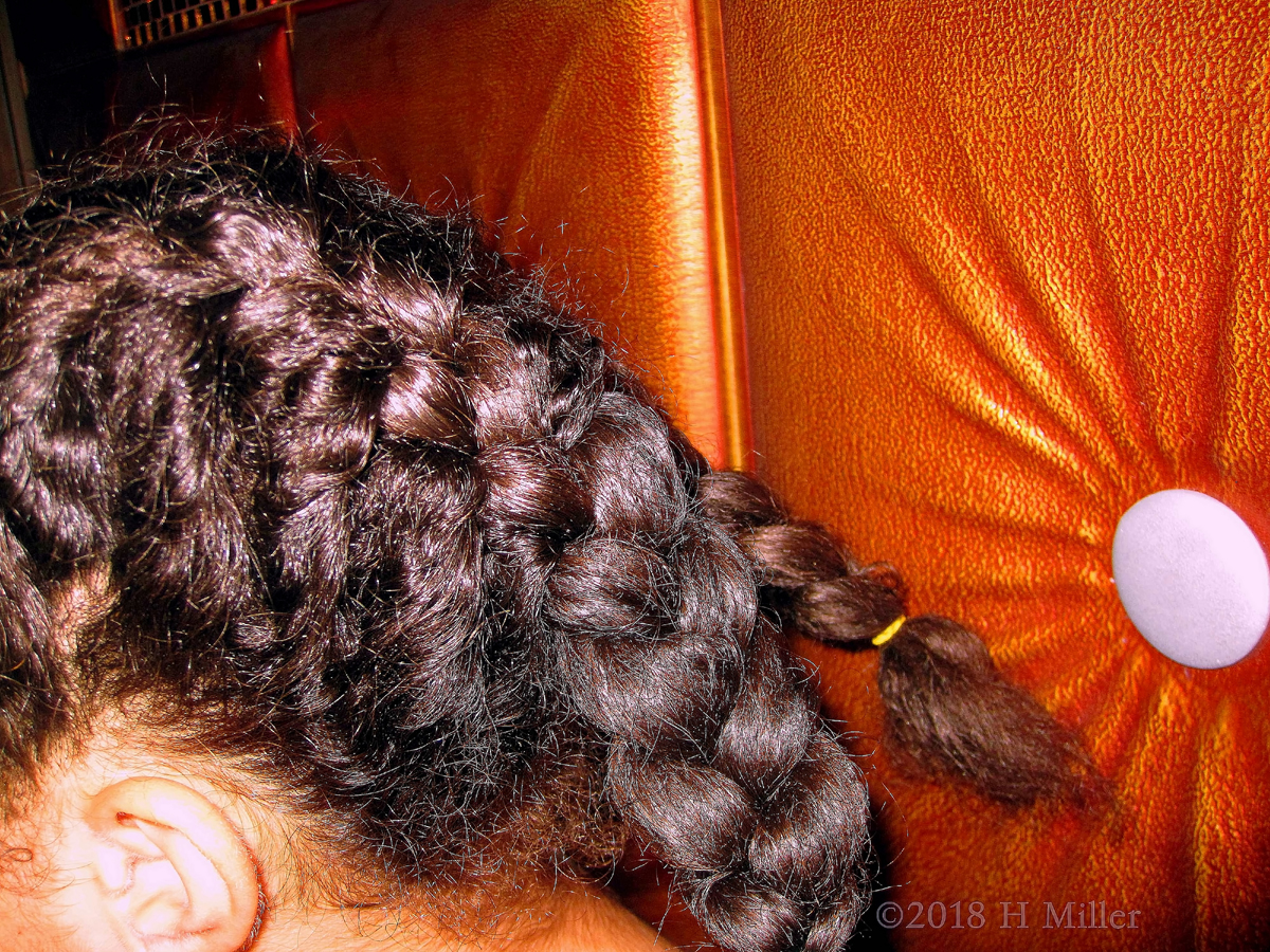 Side View Of Dutch French Braids In Kids Hairstyling. 