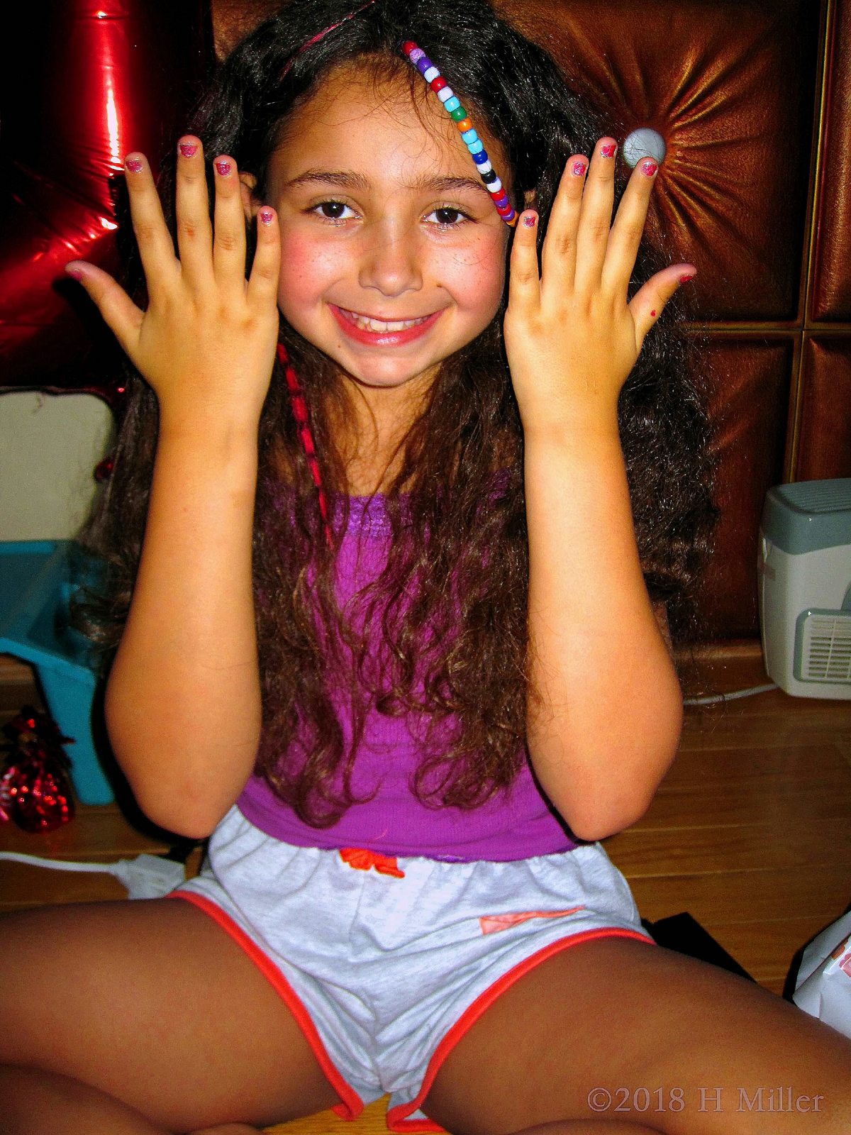 Birthday Girl Shows Off Her Glittery Kids Manicure. Birthday Girl Shows Off Her Glittery Kids Manicure.