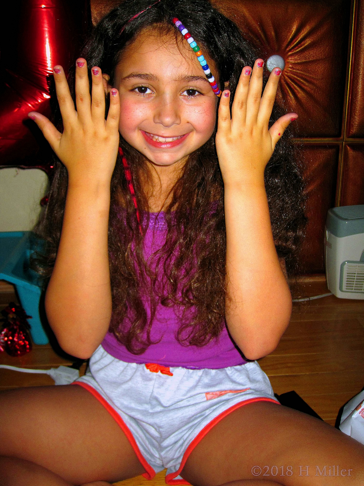 Birthday Girl Shows Off Her Glittery Kids Manicure.