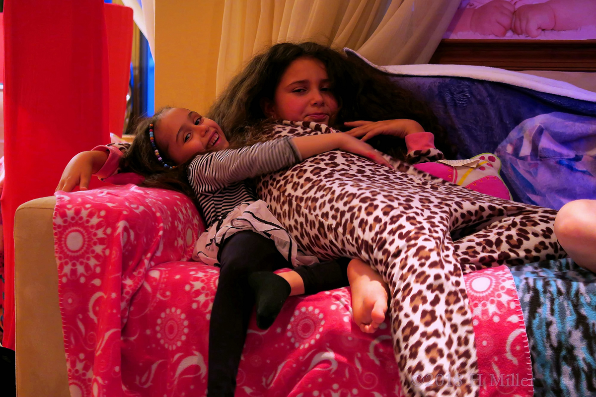 Rianna Being Hugged By Her Friend.