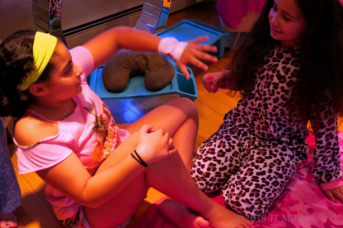 While Having Jagua Tattoo Fun At The Kids Spa, Rianna Chats With Her Friend.