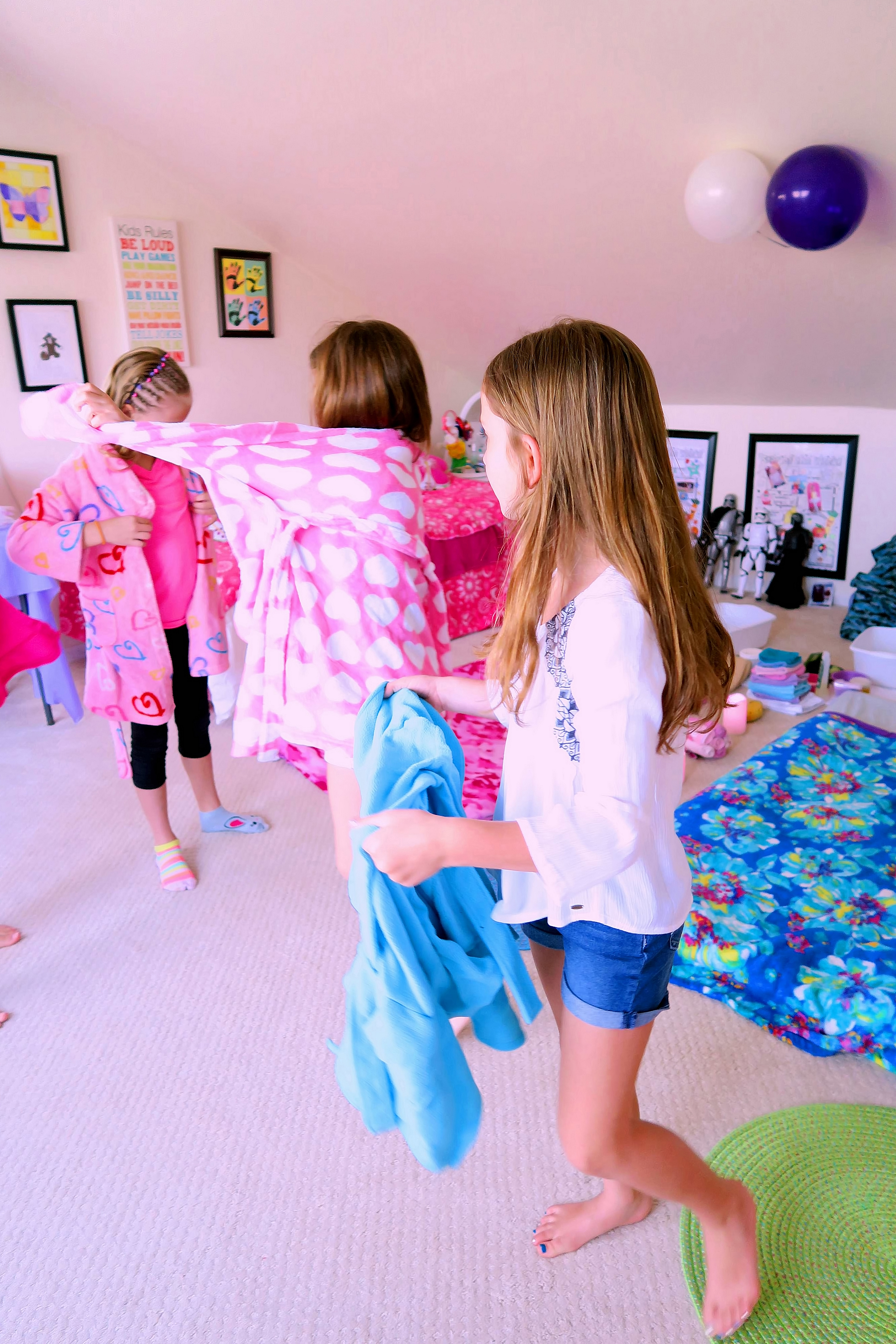 She Chooses A Blue Robe But Then Decides Another Is Nicer. She Chooses A Blue Robe But Then Decides Another Is Nicer.